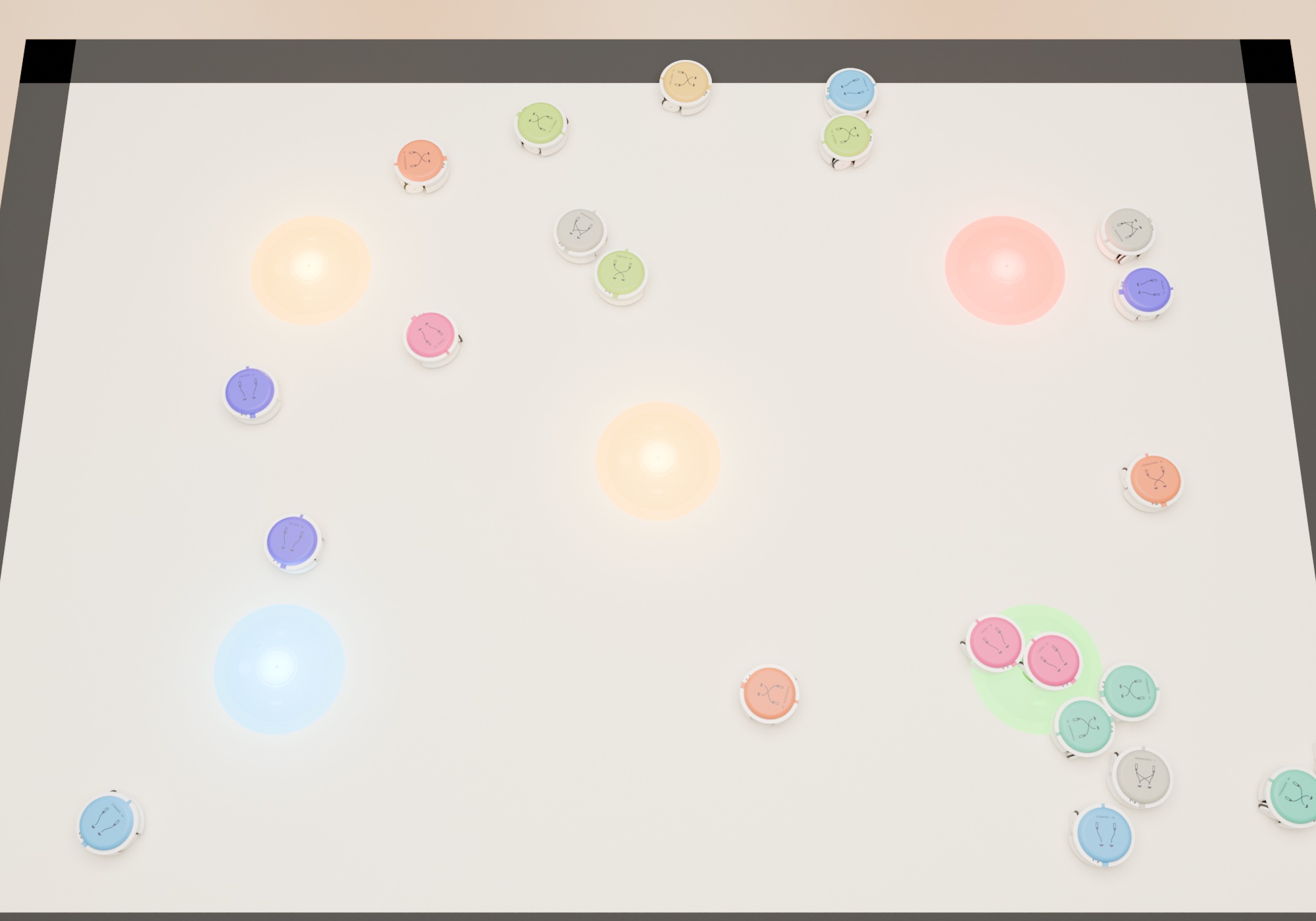 The whole mat from above, mid-game: bots of every colour among five glowing pads.